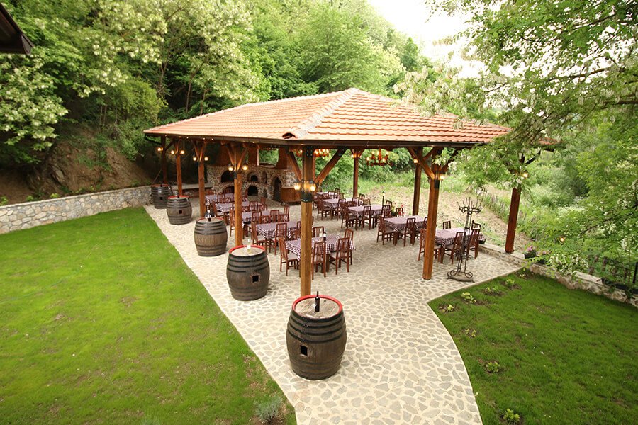 Guests enjoying a wine tasting experience at Monastery Winery in Ohrid, North Macedonia